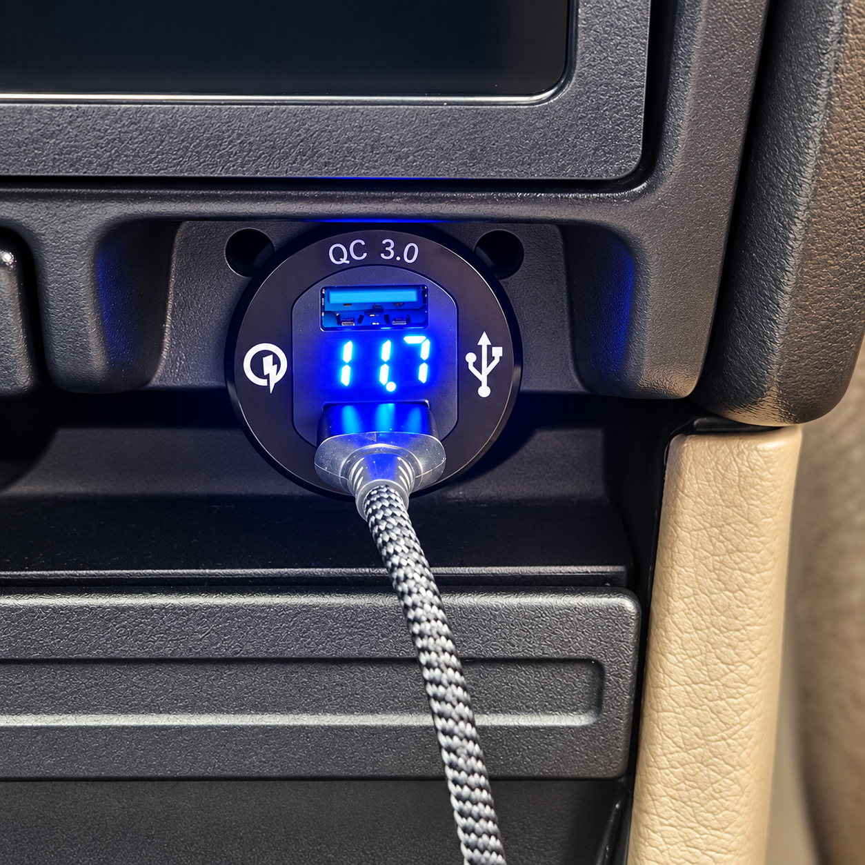 Flush-mount USB charger panel installed in a vehicle dashboard with voltage display
