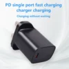 PD single port fast charging wall charger in black with USB-C output, UK plug